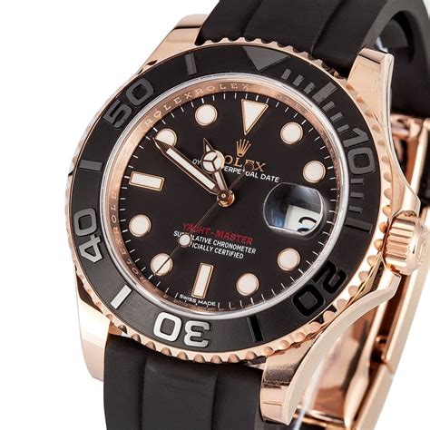 rolex black band gold